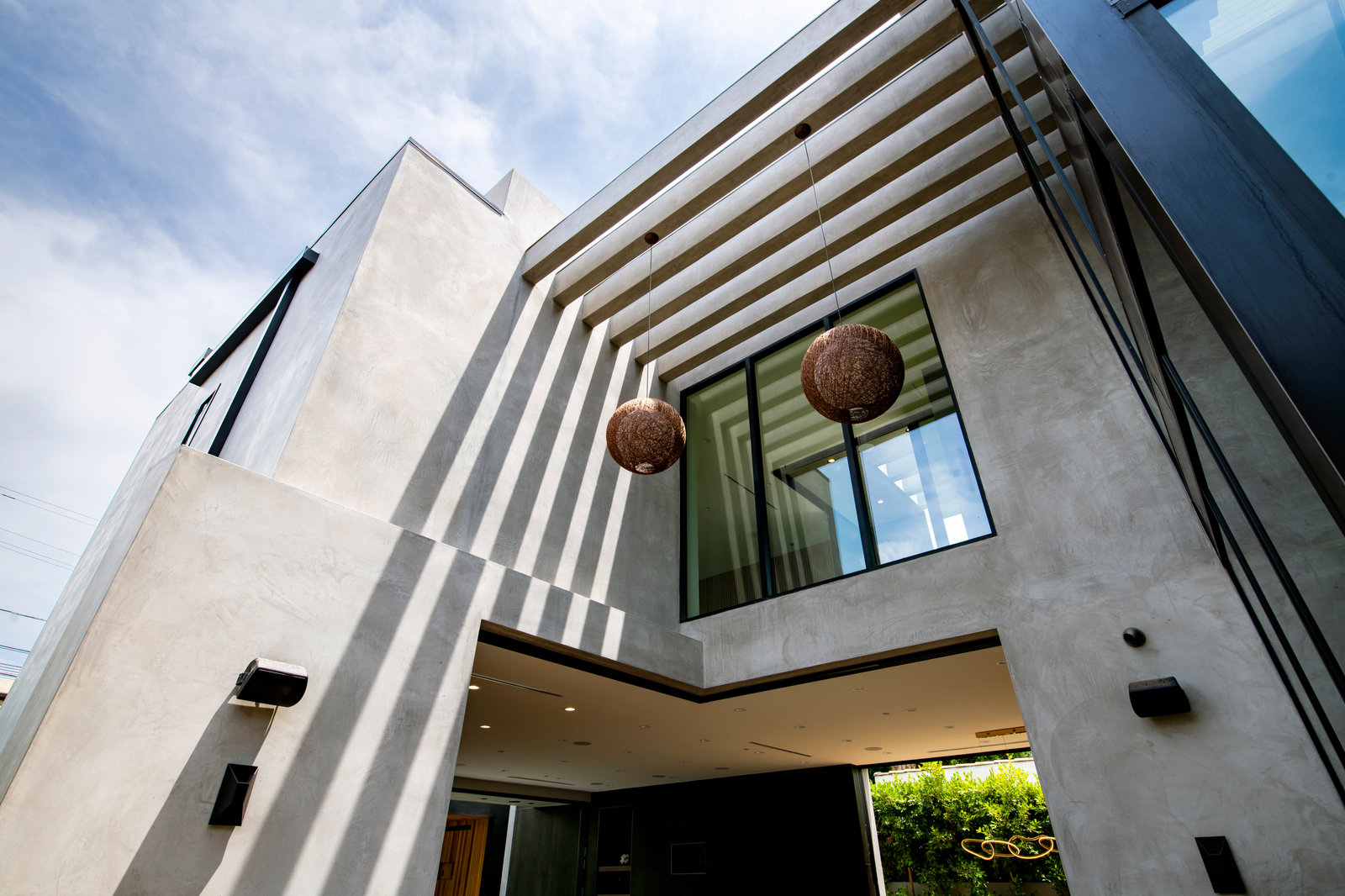Casa De Flor — Exterior fins and pendant lighting