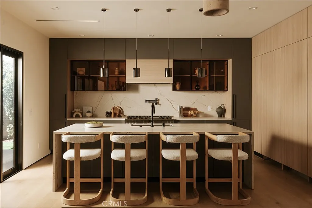 Casa Serena — Kitchen island and oak cabinetry